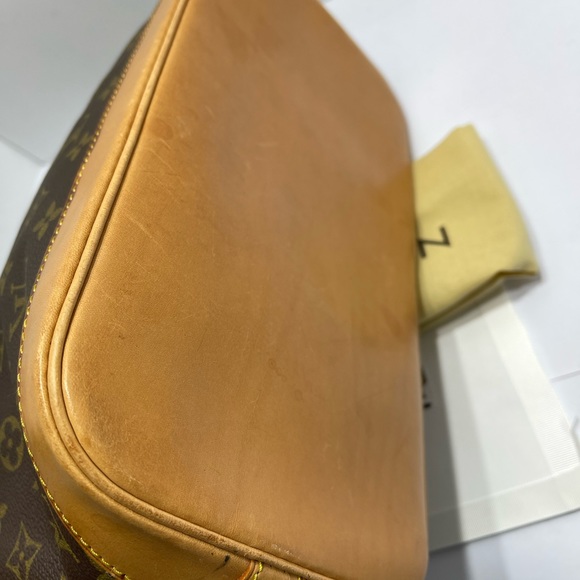 Loui Vuitton Alma in Monogram, with dust bag. - Picture 6 of 16